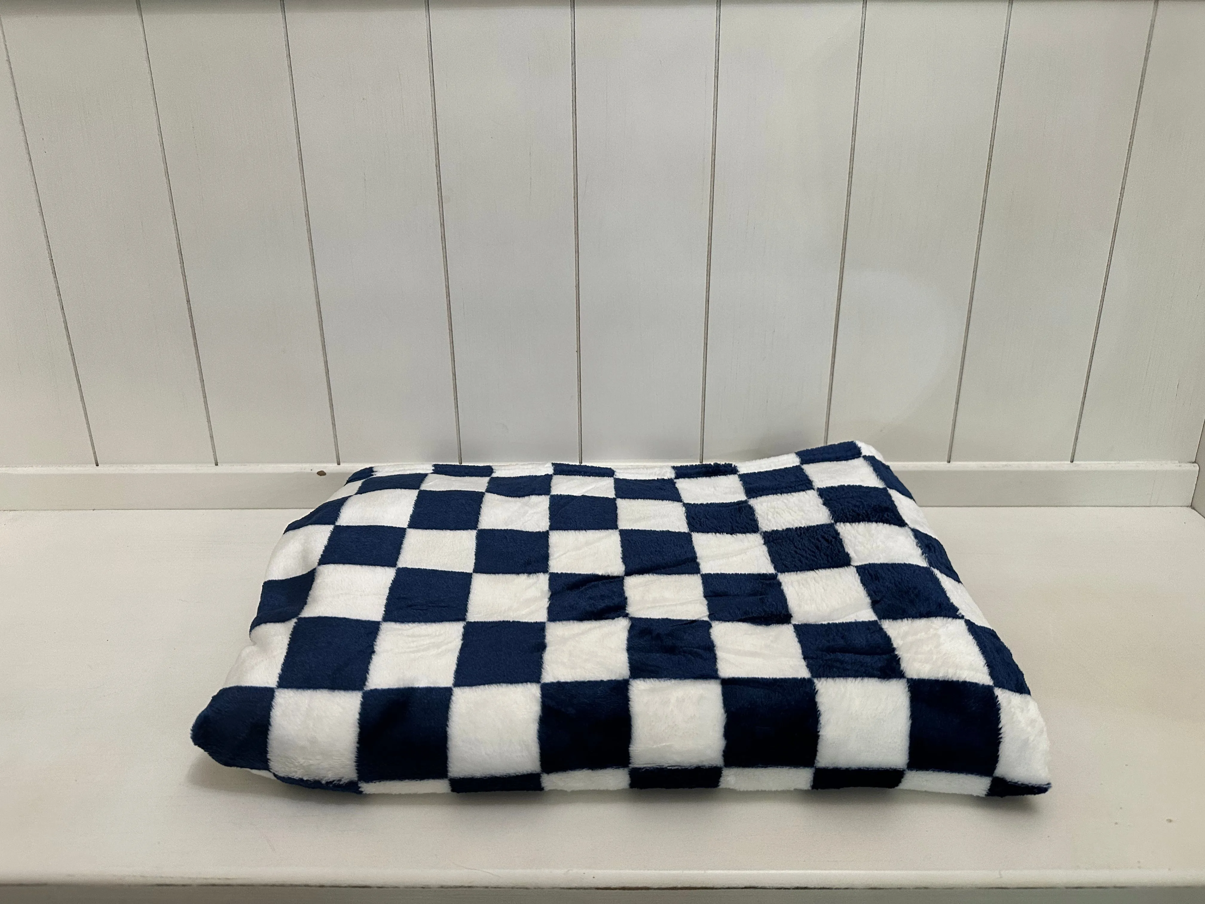 Blue and white checkered blanket