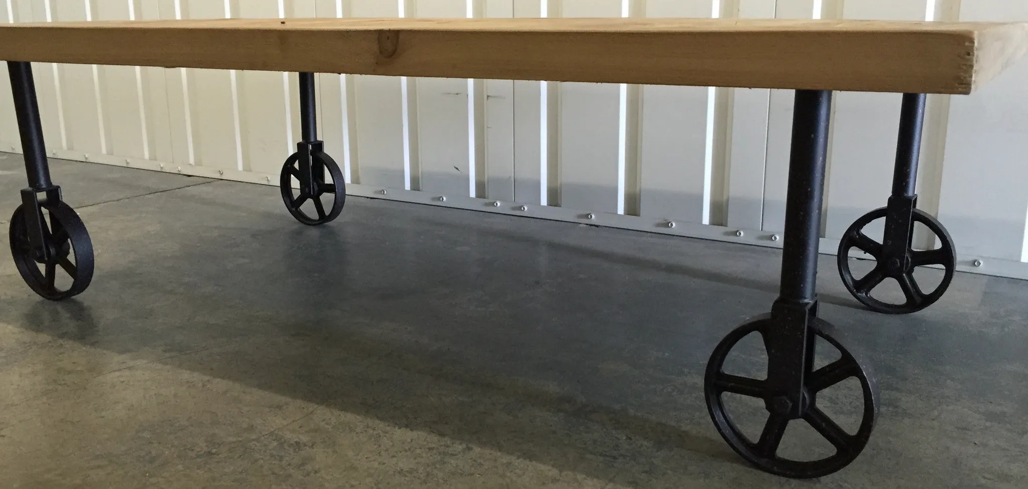 Industrial Chic Wood Coffee Table With Industrial Wheels