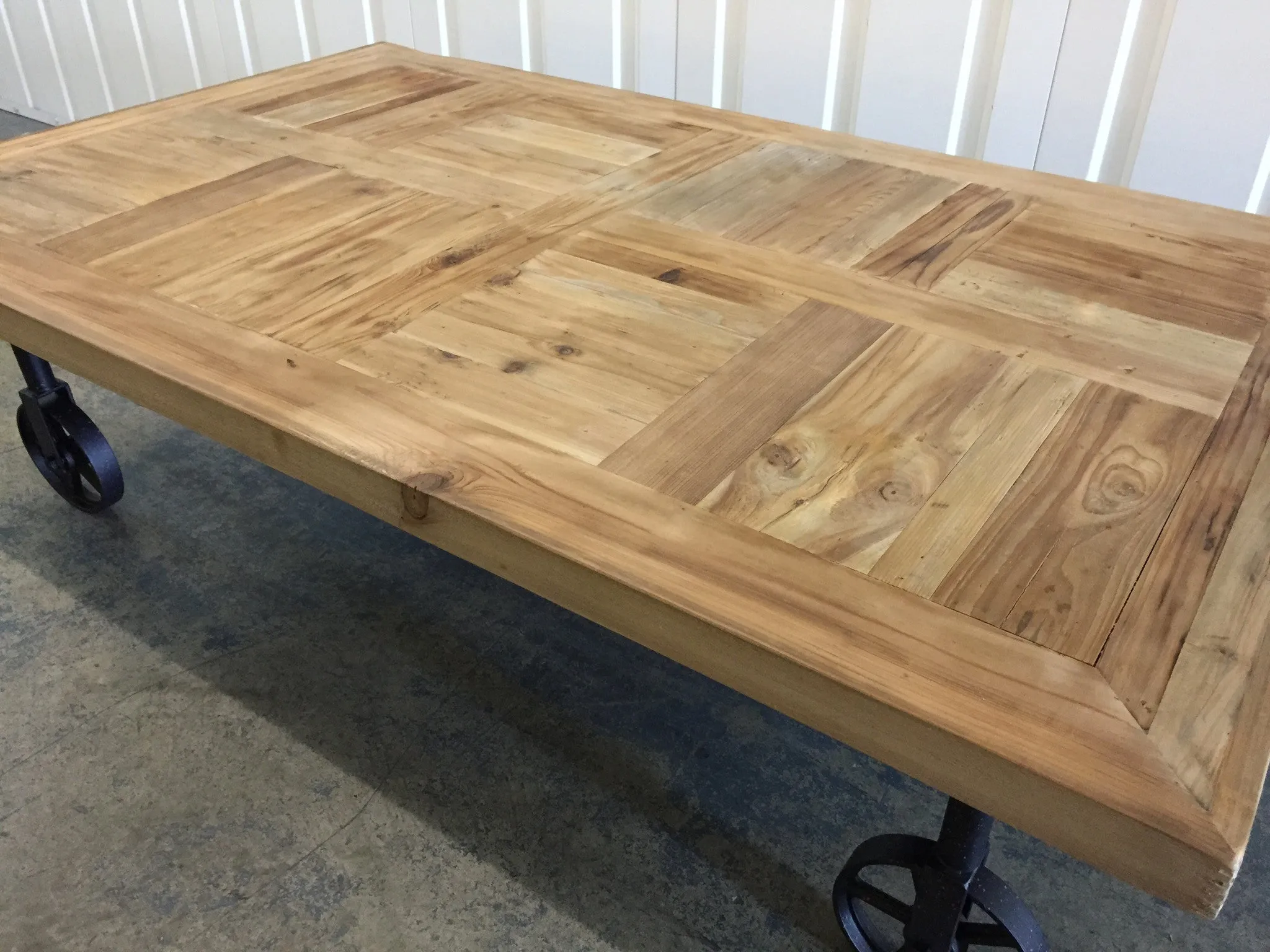 Industrial Chic Wood Coffee Table With Industrial Wheels